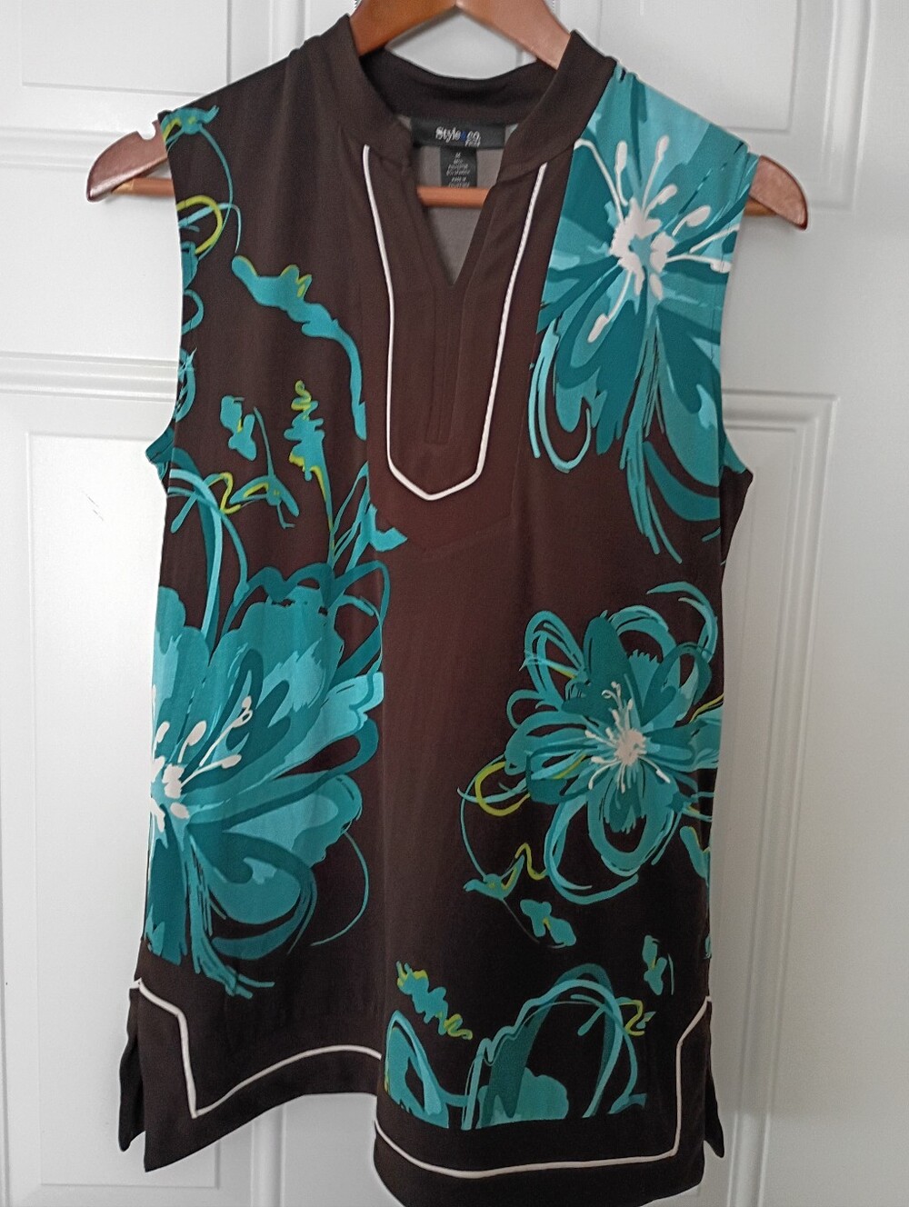Sleeveless Floral Print Top in Teal and Brown . 95% Polyester 5% Spandex